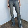 Woman wearing a Y2K 00s Ralph Lauren collab Chaps Jeans warm wash low rise flared 