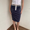 Woman wearing a Y2K 00s sportalm navy and white sporty midi skirt 