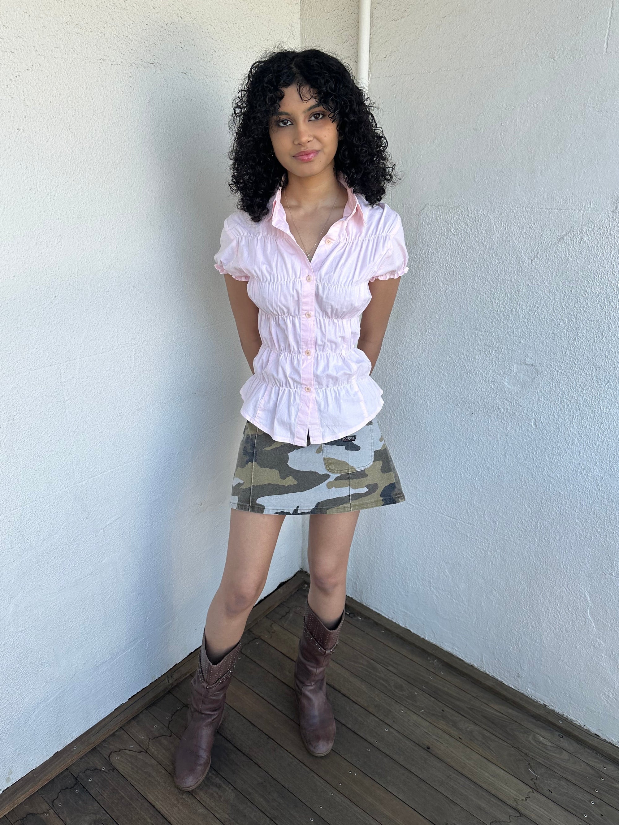 Women wearing a 00s Y2K Baby pink reworked cinched shirt featuring gathered detailing at the waist for a fitted silhouette.