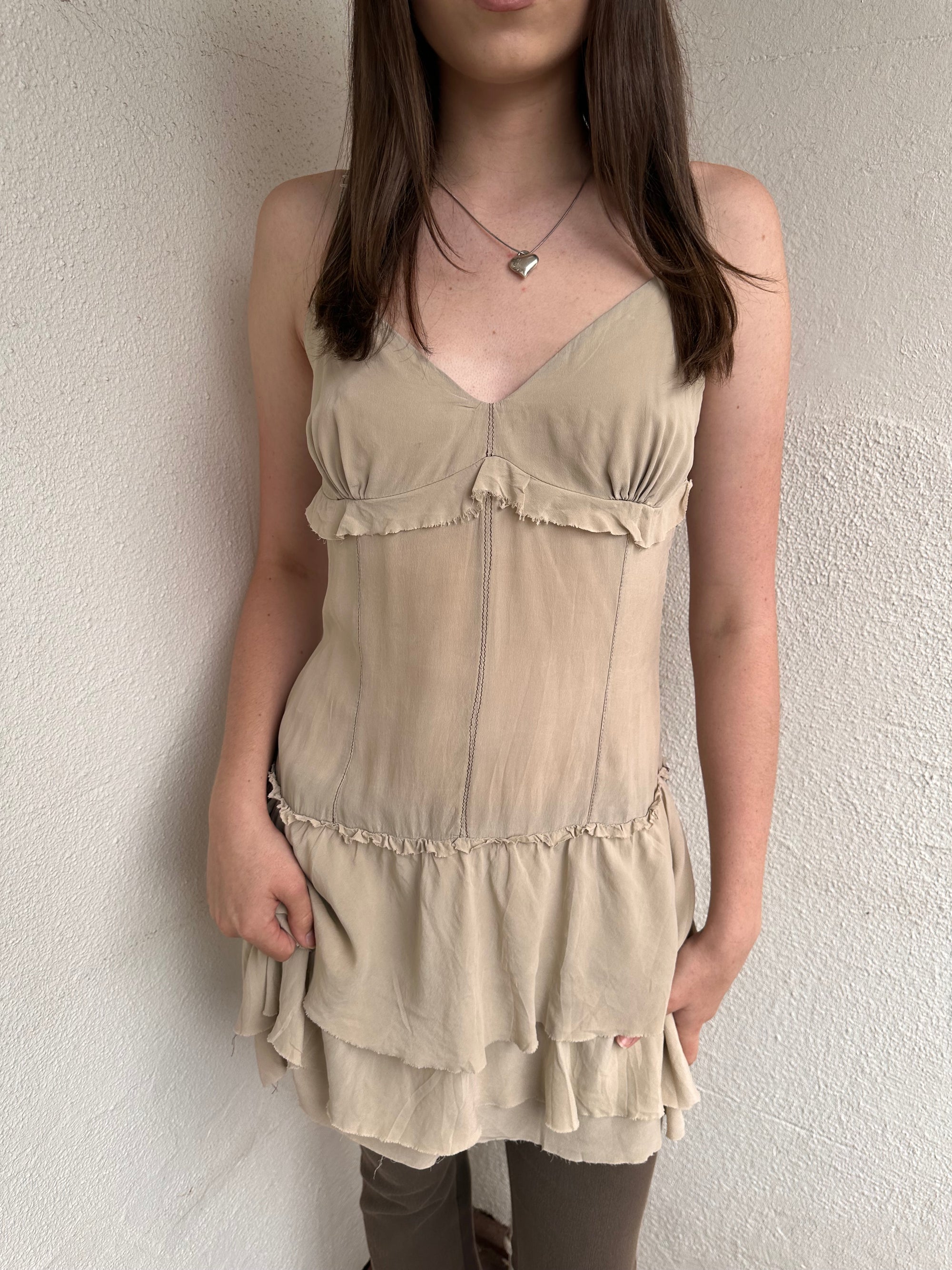 Women wearing a 00s Y2K Light beige boho layered mini dress with a flowy silhouette and soft textured fabric.