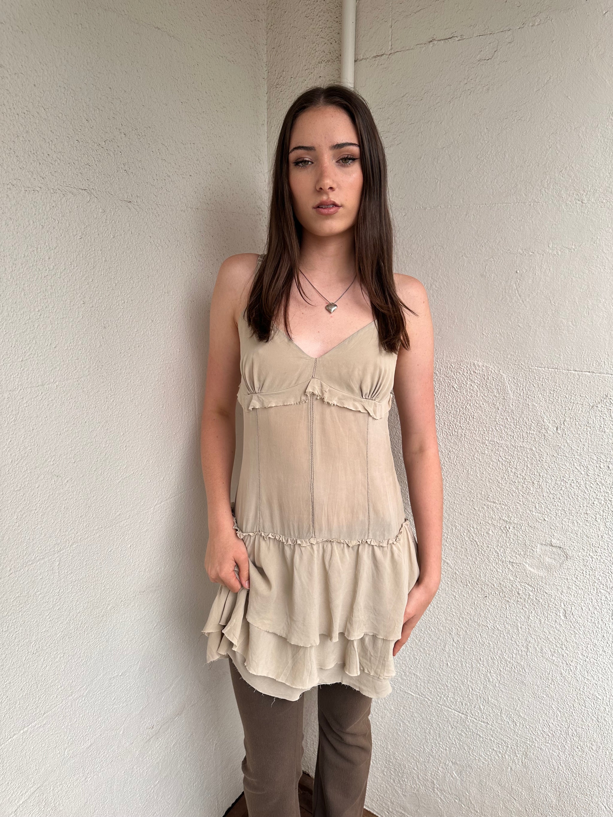 Women wearing a 00s Y2K Light beige boho layered mini dress with a flowy silhouette and soft textured fabric.