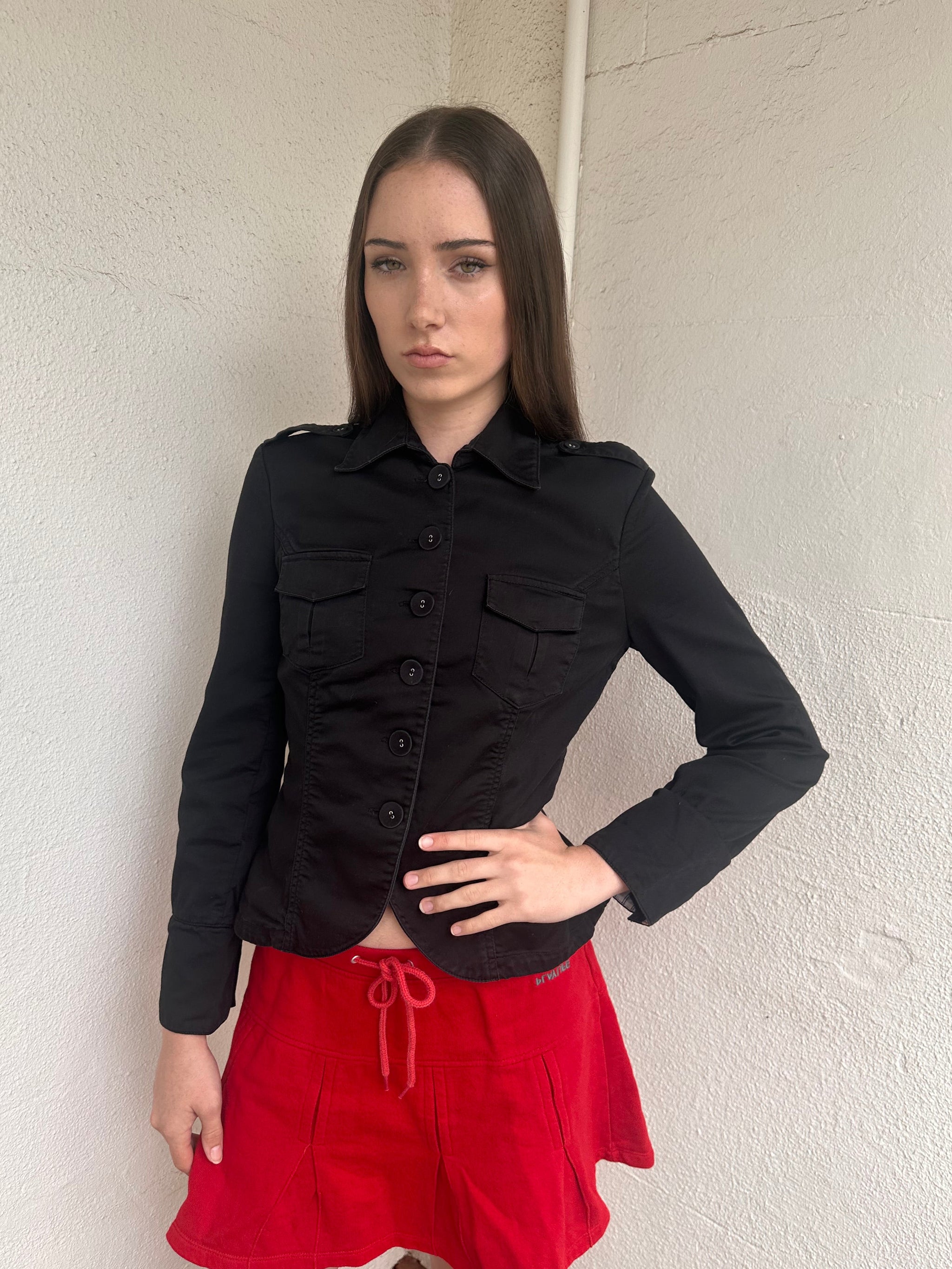 Women wearing a 00s Y2K Black fitted button-up jacket from the 2000s crafted from stretch cotton