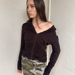 Women wearing a 00s Y2K Brown cinched zip-up cardigan featuring a wide collared neckline and fitted waist. 