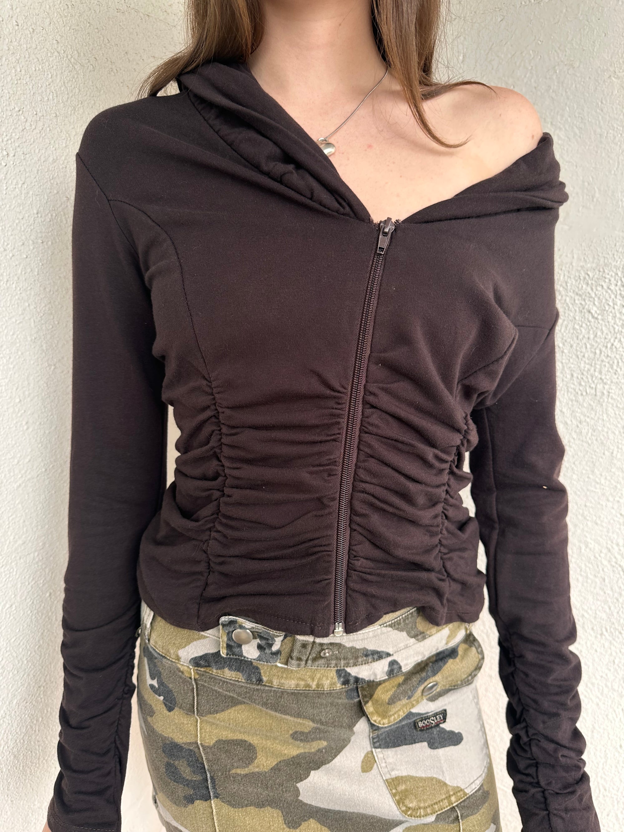 Women wearing a 00s Y2K Brown cinched zip-up cardigan featuring a wide collared neckline and fitted waist. 