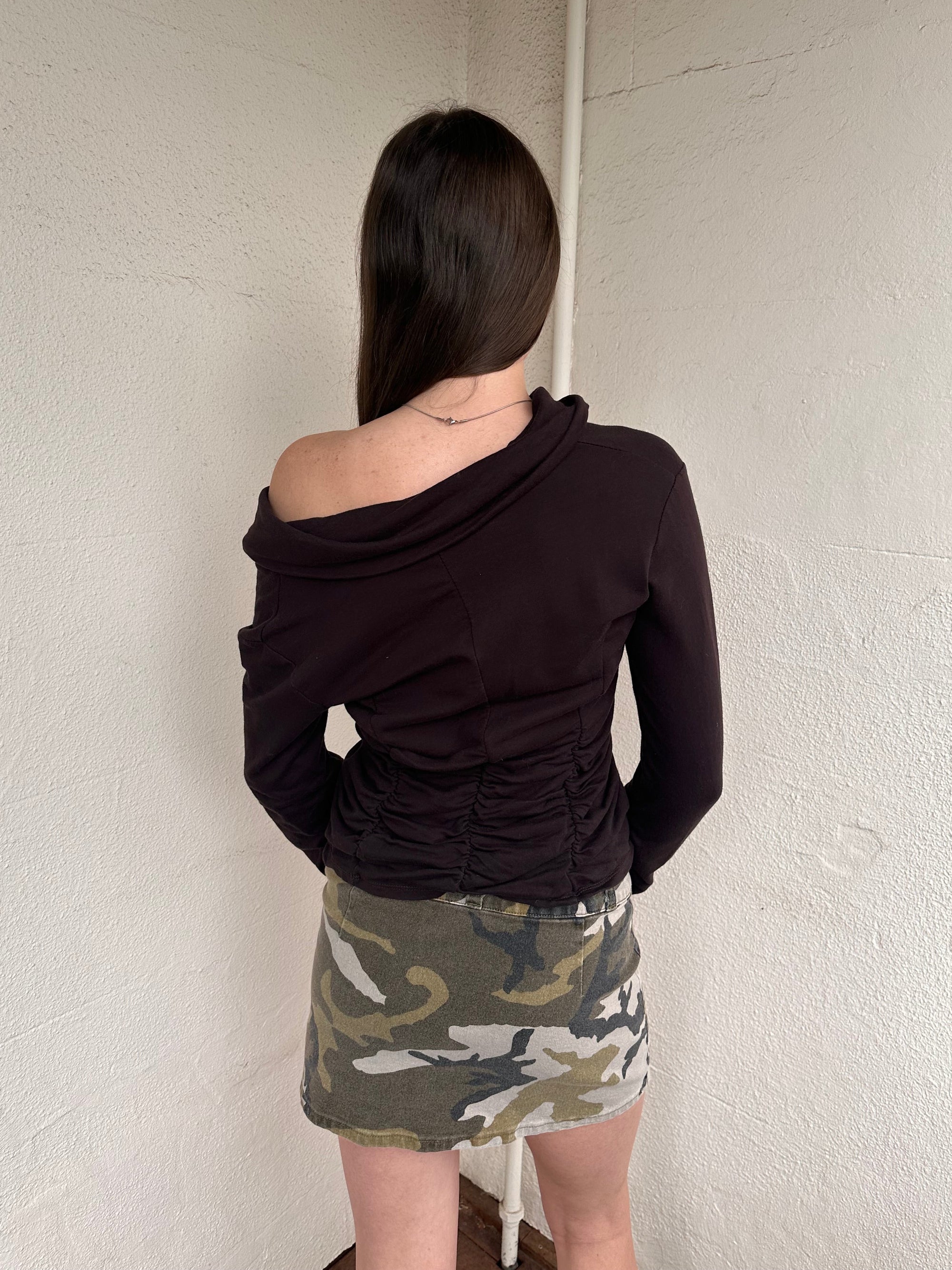 Women wearing a 00s Y2K Brown cinched zip-up cardigan featuring a wide collared neckline and fitted waist. 