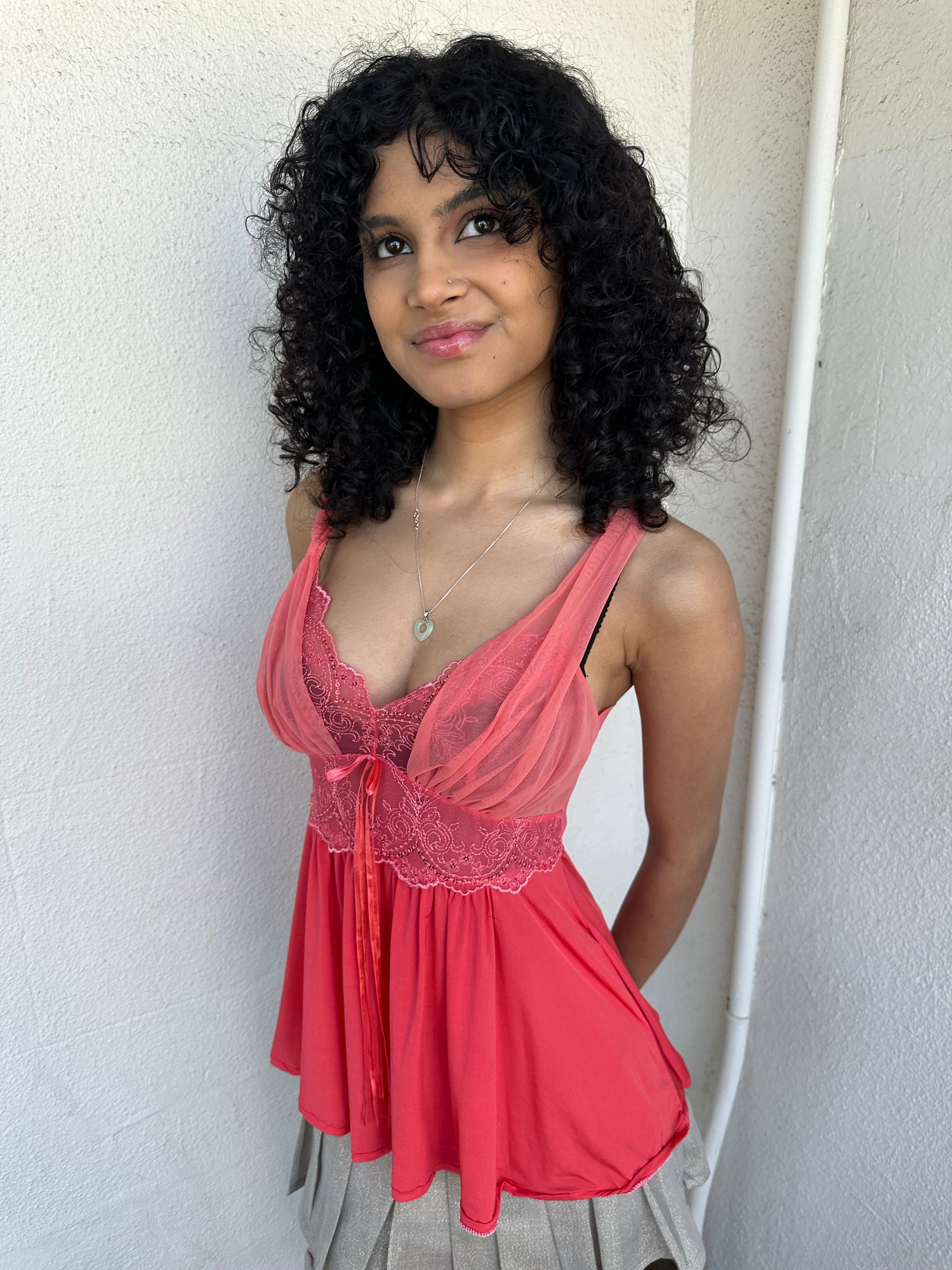 Woman wearing a Y2K 00s Coral cami featuring a mesh layered bust with delicate floral embroidery, lace trim, and subtle sequin details