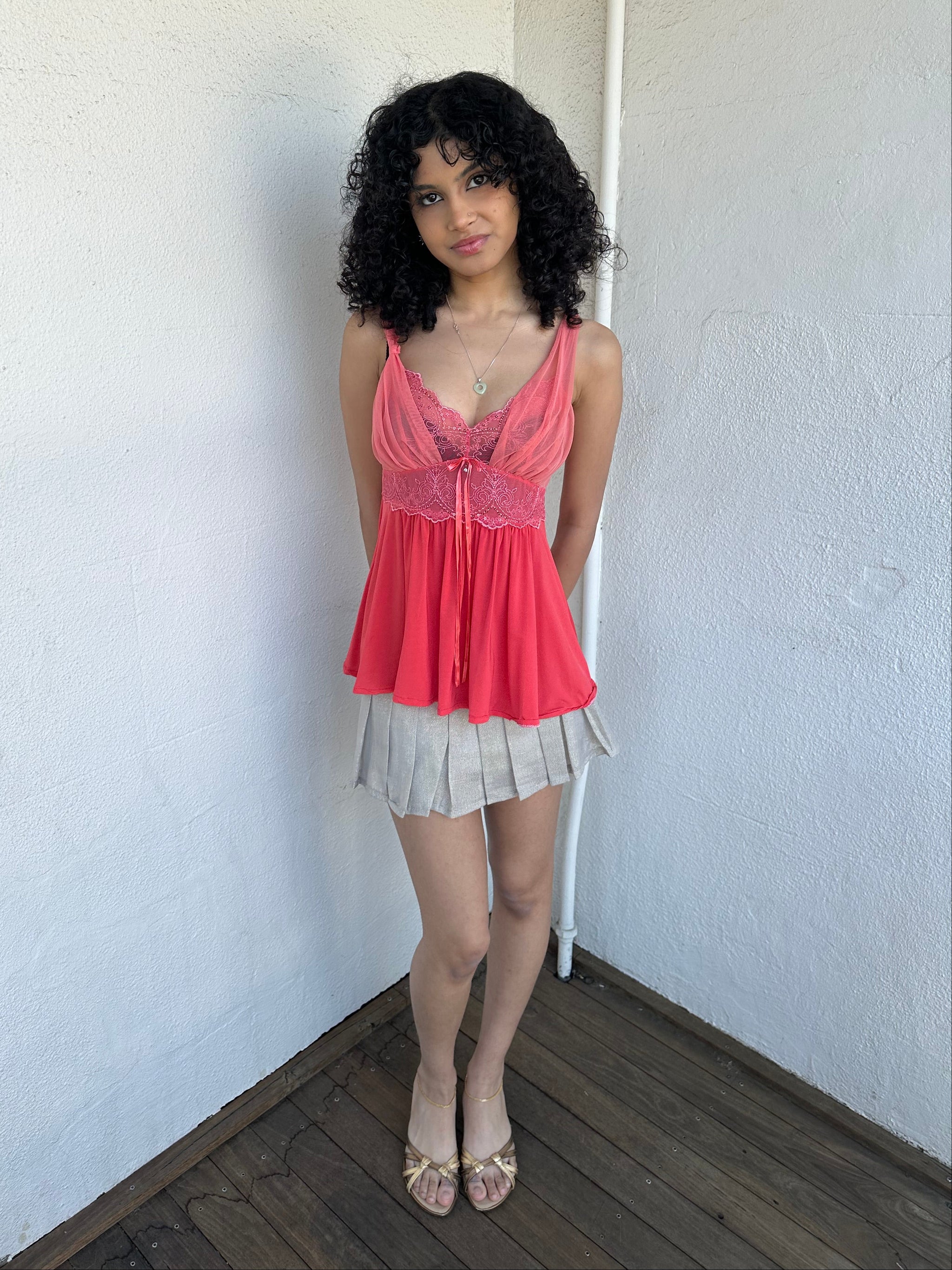 Woman wearing a Y2K 00s Coral cami featuring a mesh layered bust with delicate floral embroidery, lace trim, and subtle sequin details