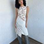 Woman wearing a Y2K 00s Cream lace midi dress with a pink floral pattern and a mix of sheer and non-sheer lace panels