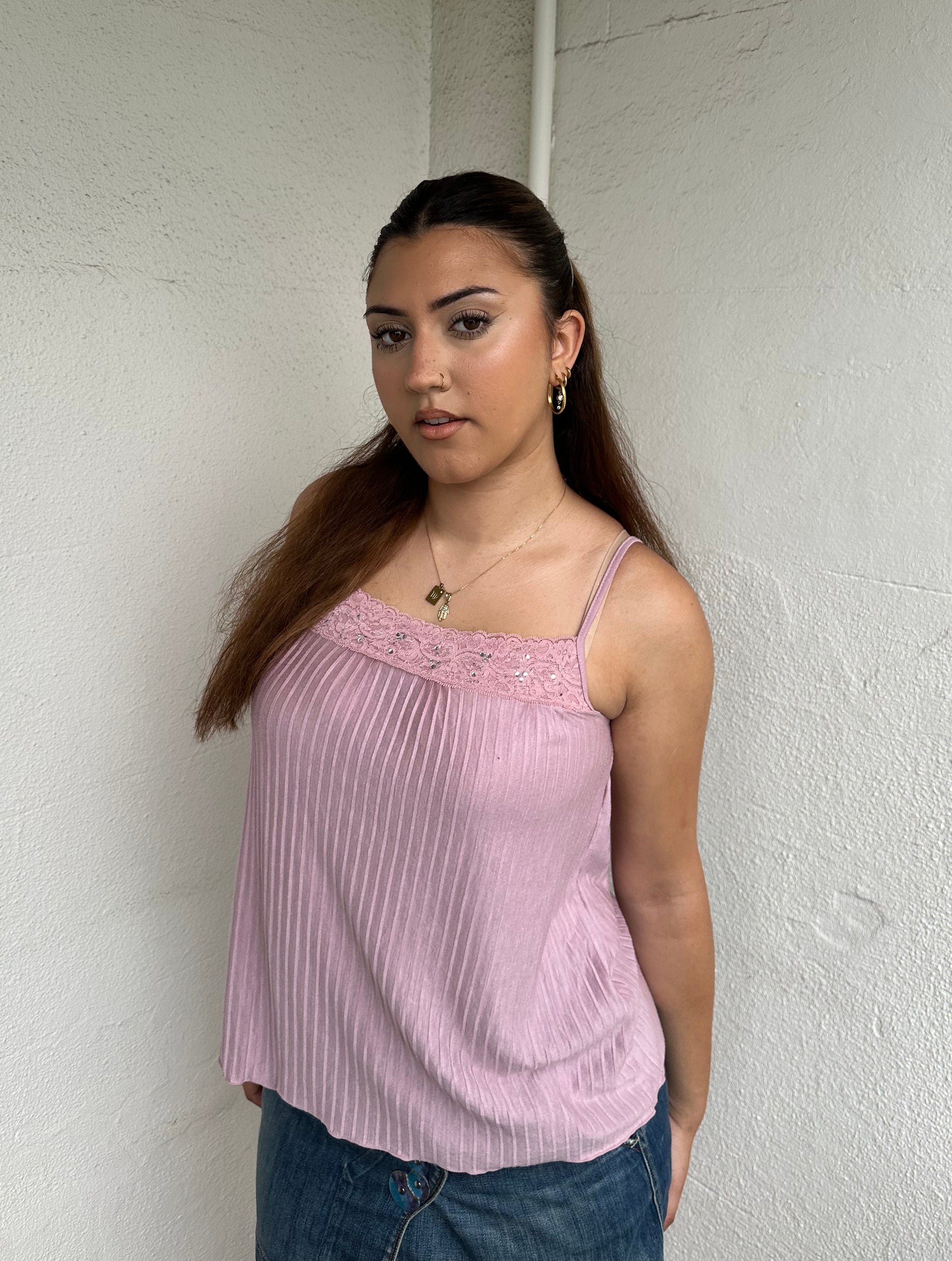 Woman Dressed in Y2K 00s Dusty pink lace trim cami featuring a soft dusty pink tone