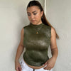 Woman Dressed in Y2K 00s Green and silver snake print tank top featuring a shimmering snake print throughout.