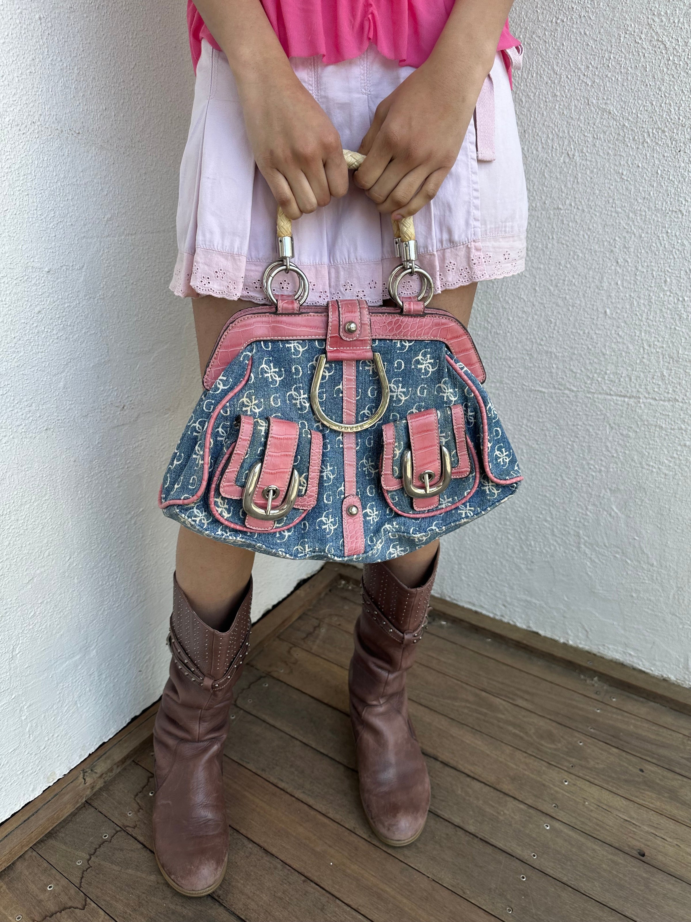 Woman wearing a Y2K 00s Guess Denim Monogram Satchel Bag