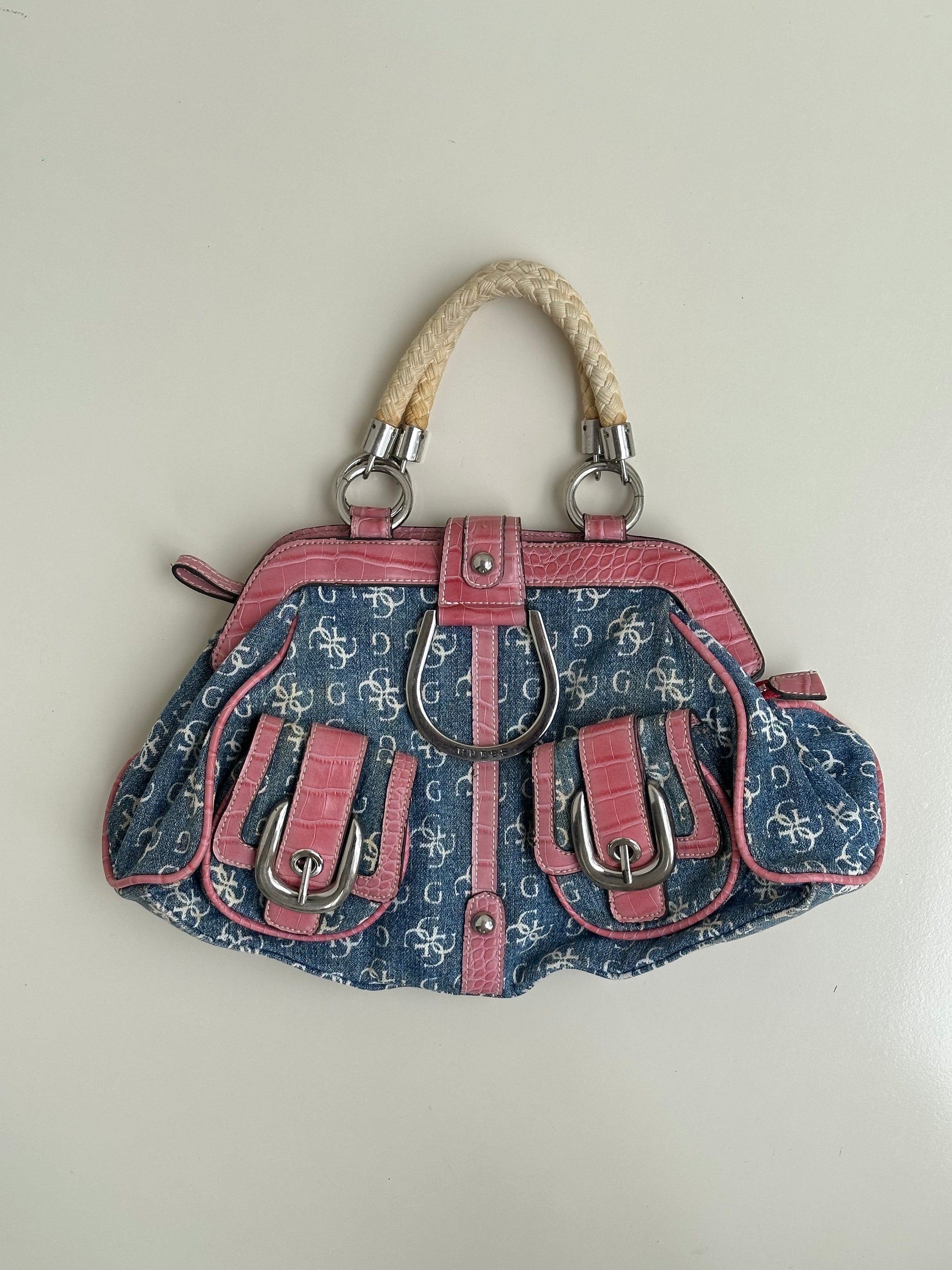 Woman wearing a Y2K 00s Guess Denim Monogram Satchel Bag
