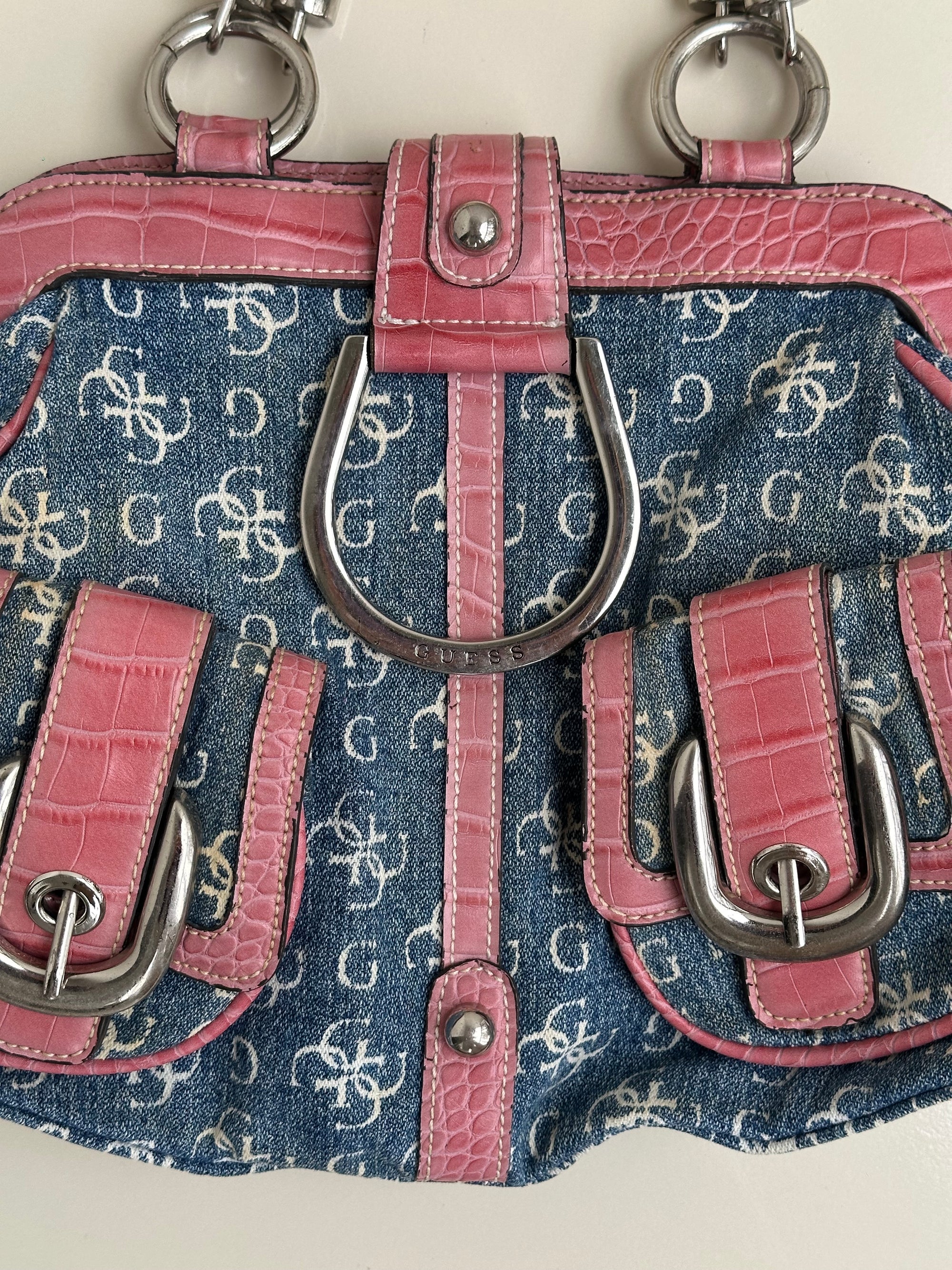 Woman wearing a Y2K 00s Guess Denim Monogram Satchel Bag