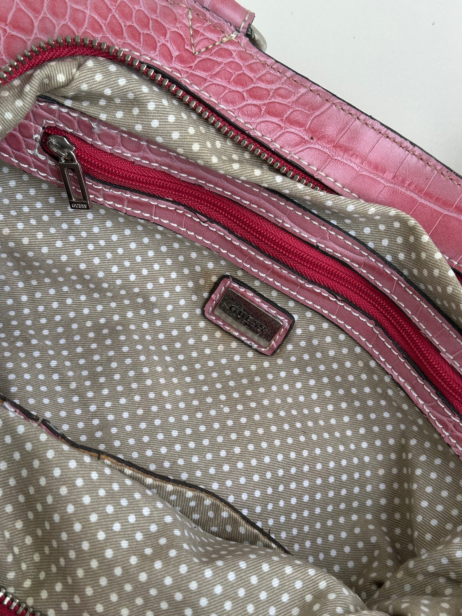 Woman wearing a Y2K 00s Guess Denim Monogram Satchel Bag