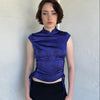 Woman Dressed in Y2K Indigo purple Asian style collar top featuring a rich tonal hue and a structured neckline inspired by traditional silhouettes.