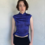 Woman Dressed in Y2K Indigo purple Asian style collar top featuring a rich tonal hue and a structured neckline inspired by traditional silhouettes.