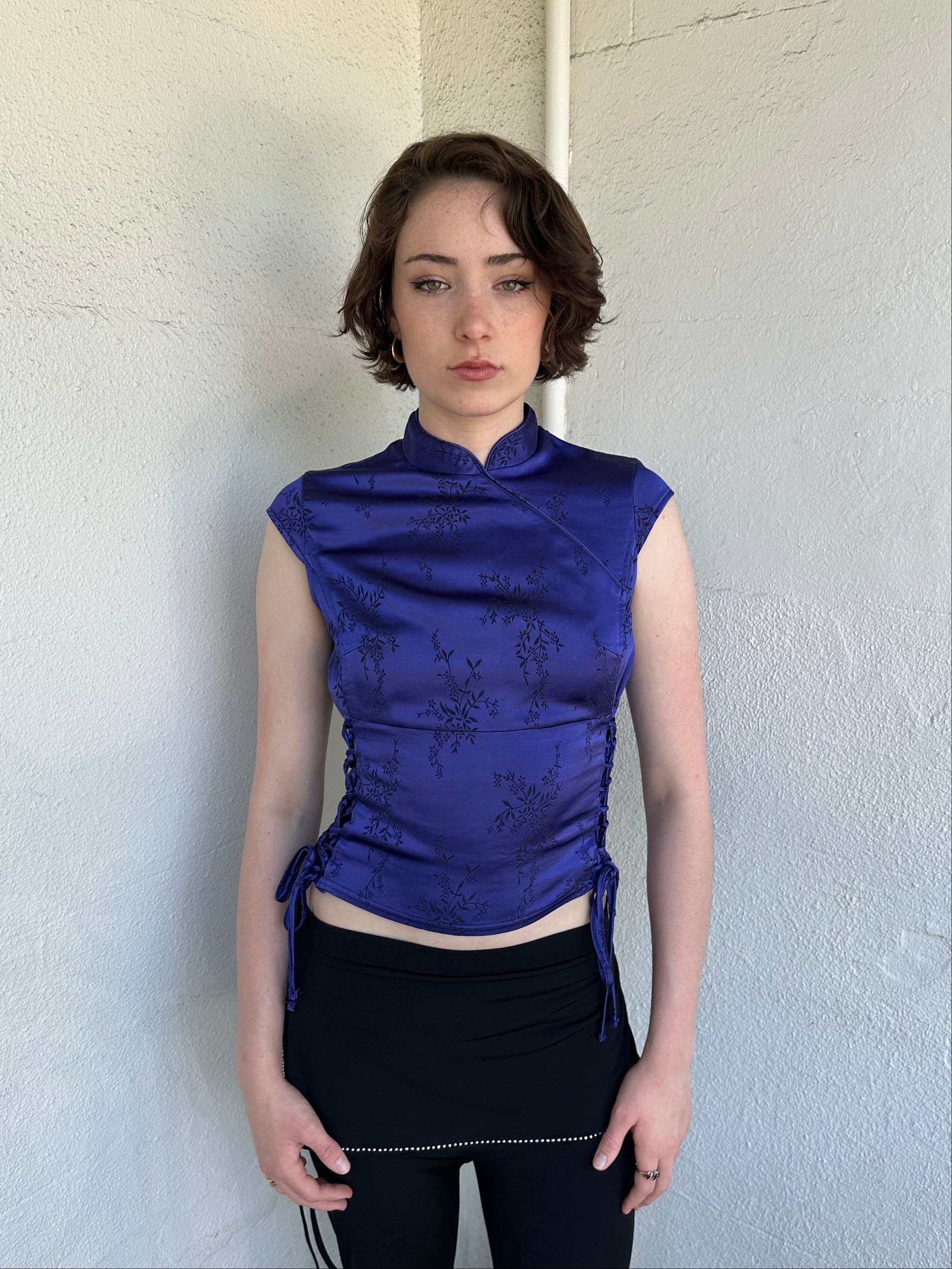 Woman Dressed in Y2K Indigo purple Asian style collar top featuring a rich tonal hue and a structured neckline inspired by traditional silhouettes.