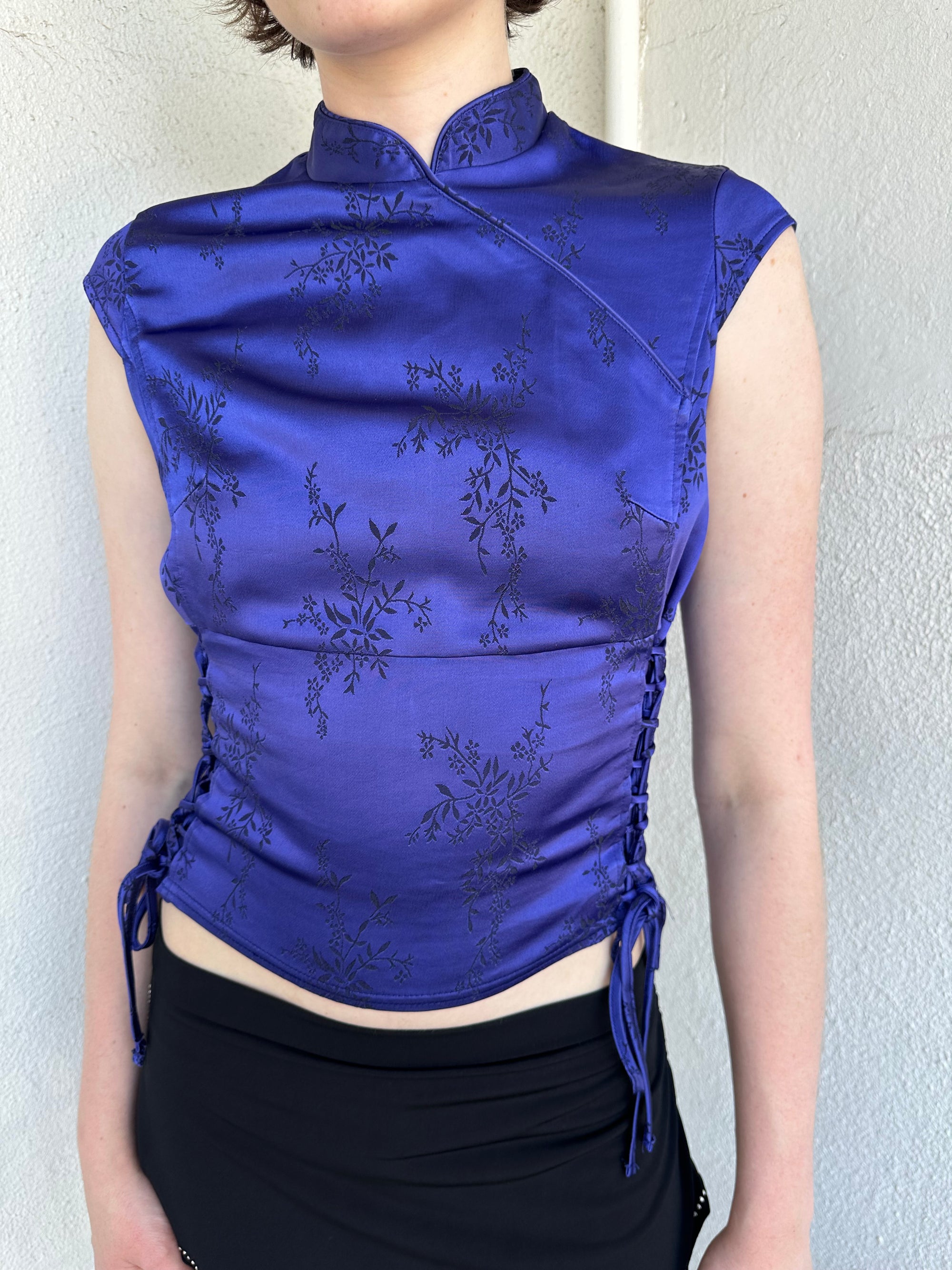 Woman Dressed in Y2K Indigo purple Asian style collar top featuring a rich tonal hue and a structured neckline inspired by traditional silhouettes.