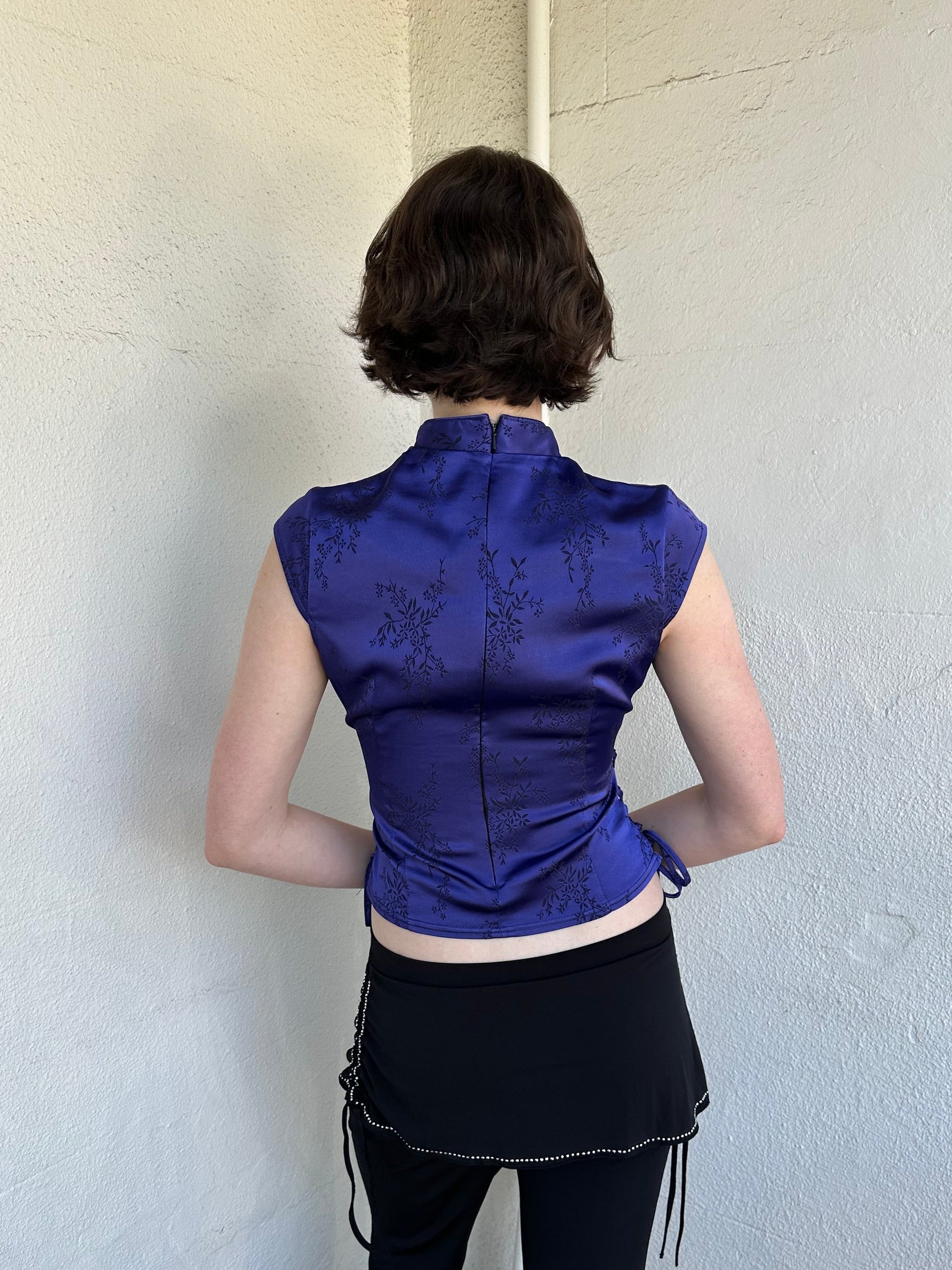 Woman Dressed in Y2K Indigo purple Asian style collar top featuring a rich tonal hue and a structured neckline inspired by traditional silhouettes.