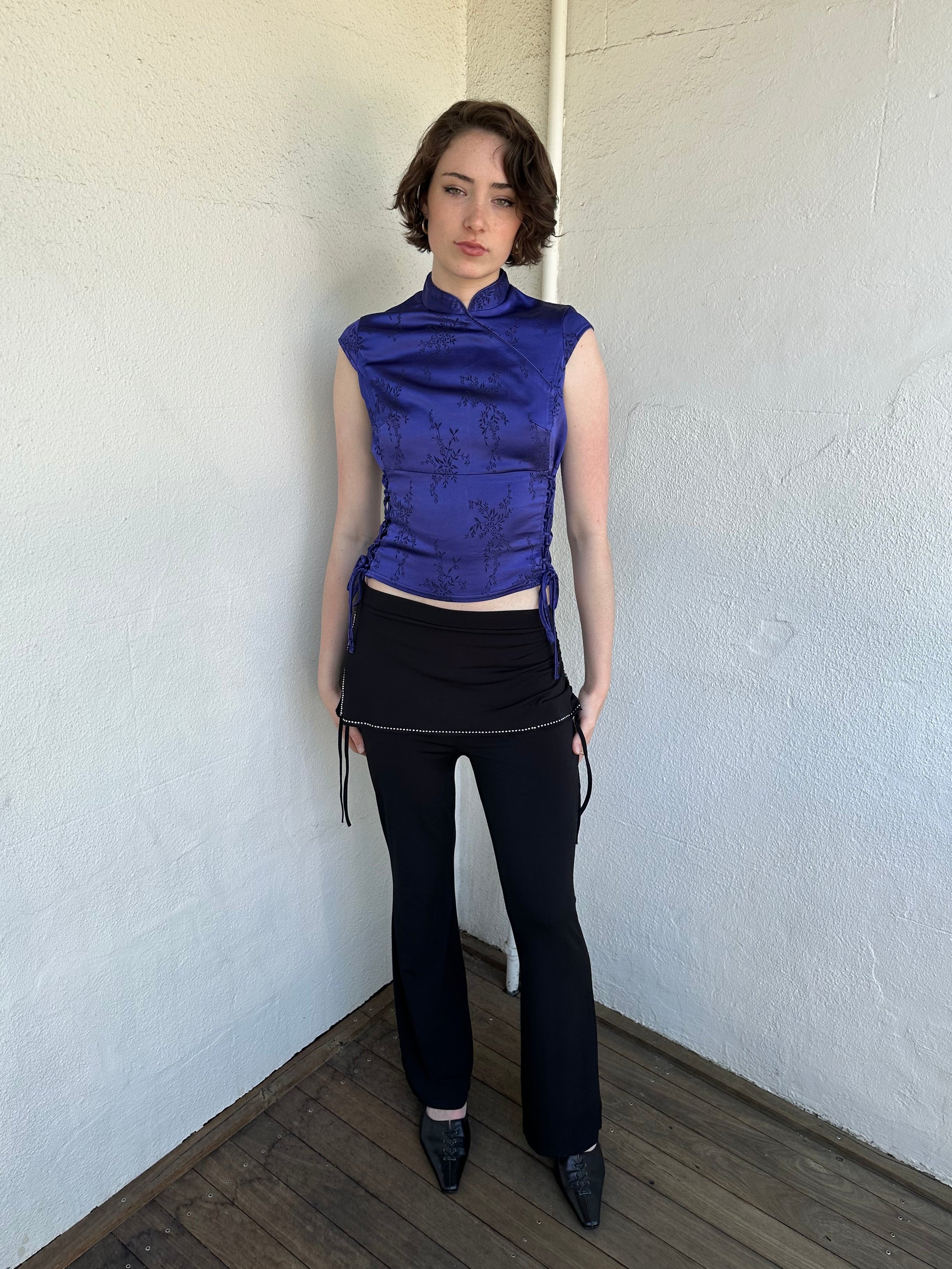Woman Dressed in Y2K Indigo purple Asian style collar top featuring a rich tonal hue and a structured neckline inspired by traditional silhouettes.