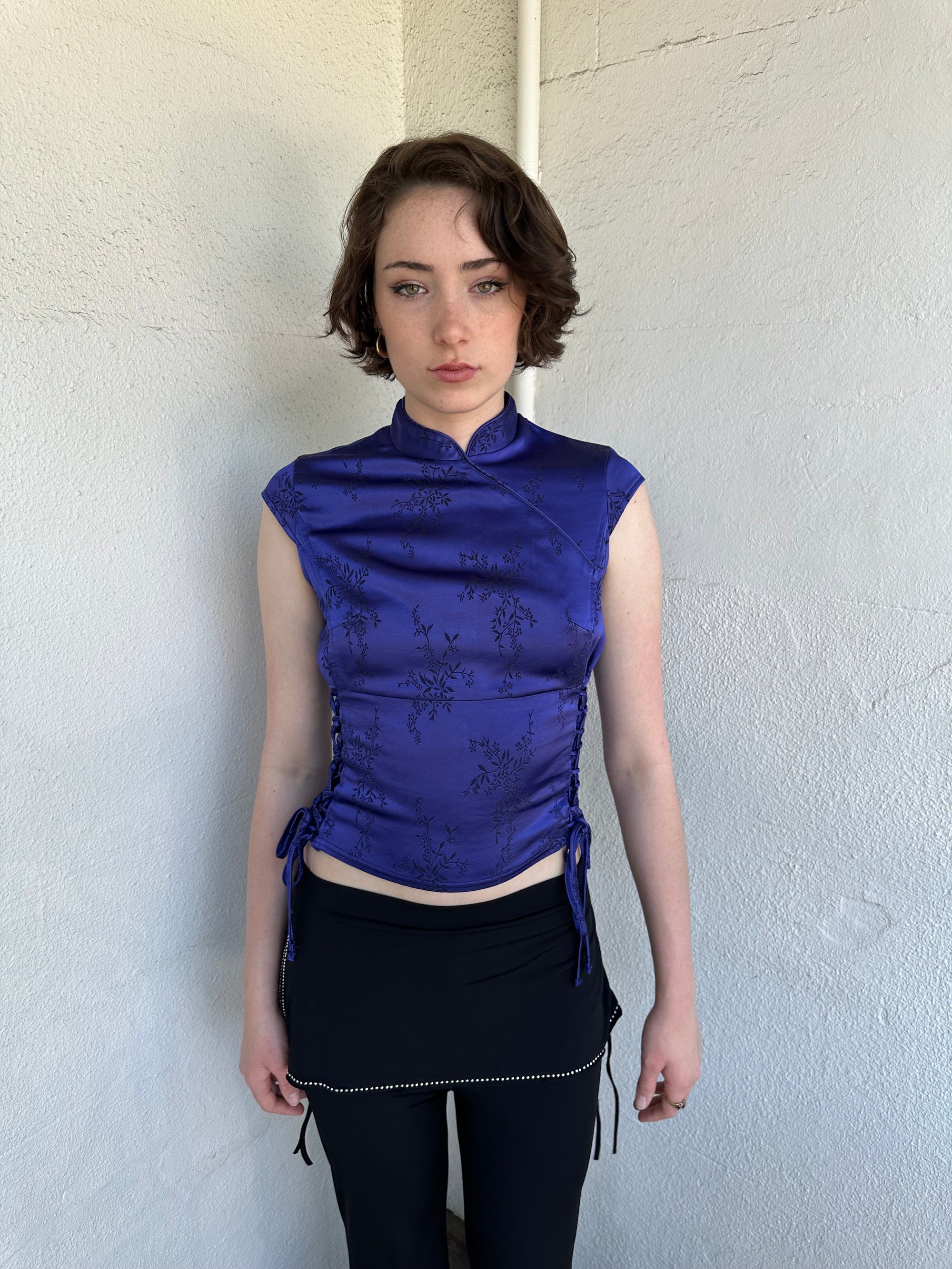 Woman Dressed in Y2K Indigo purple Asian style collar top featuring a rich tonal hue and a structured neckline inspired by traditional silhouettes.