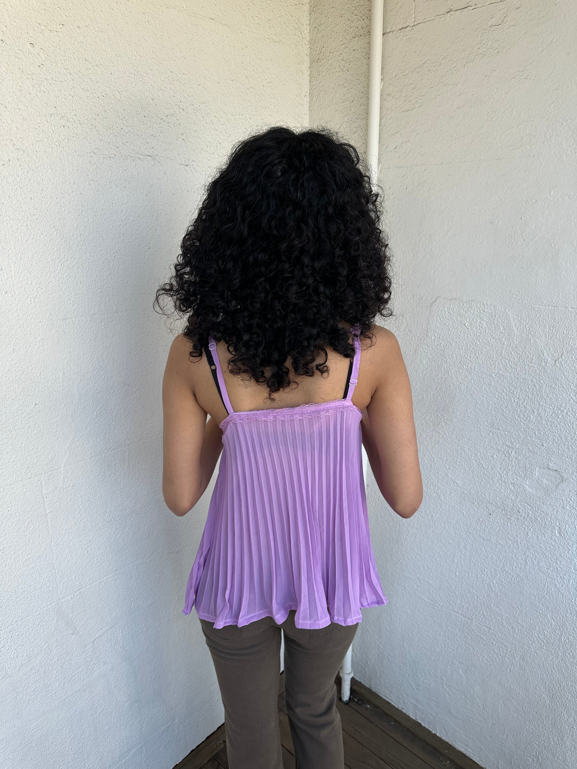 Woman wearing a Y2K 00s Lilac floral embroidered bust cami with a floaty, pleated A-line shape