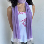Woman wearing a Y2K 00s lilac shimmer skinny scarf from the 00s.