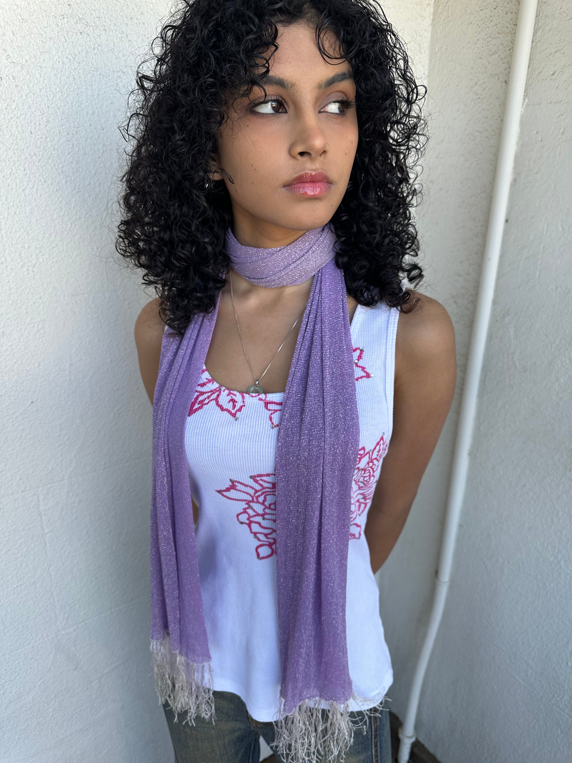 Woman wearing a Y2K 00s lilac shimmer skinny scarf from the 00s.