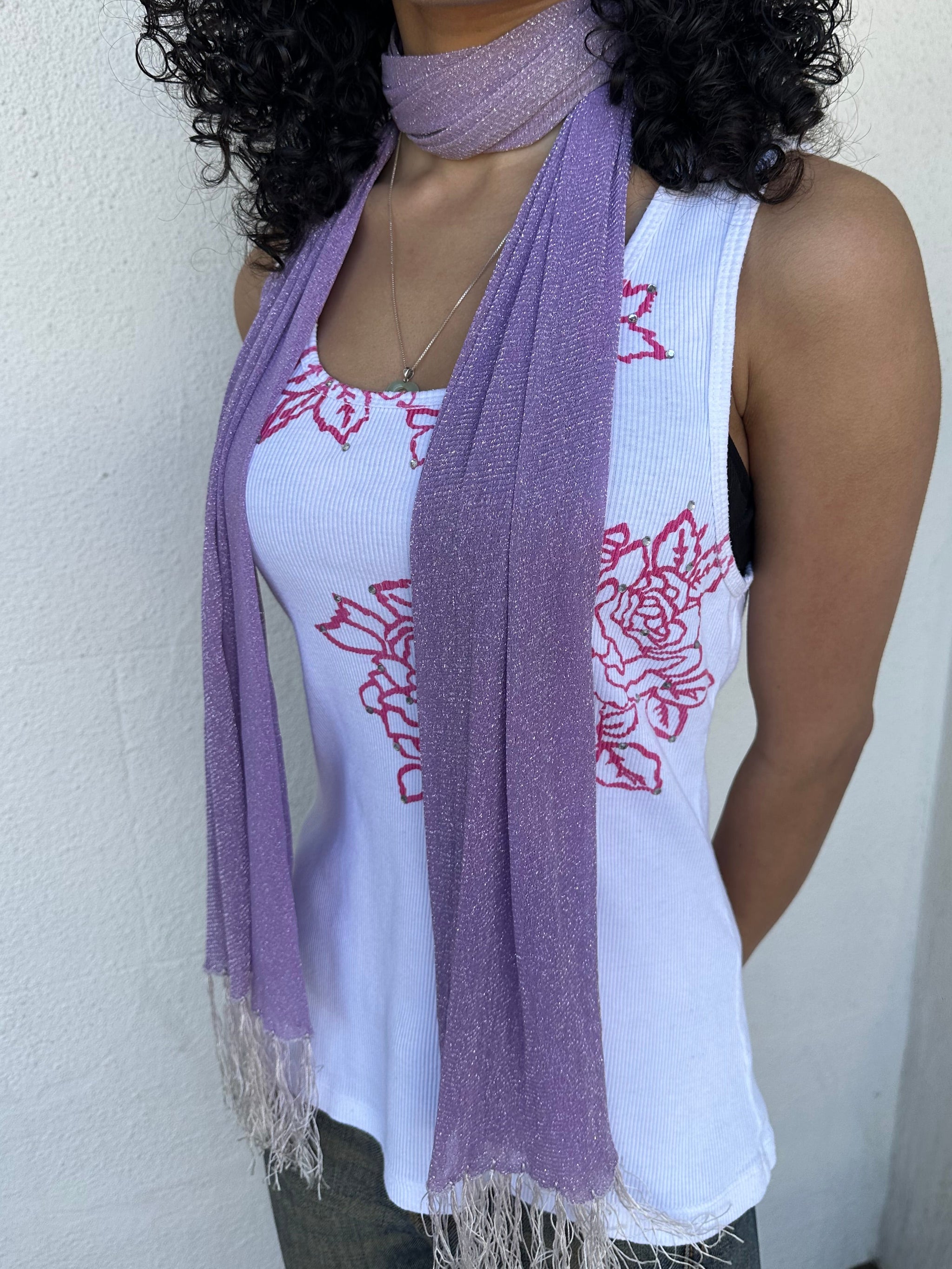 Woman wearing a Y2K 00s lilac shimmer skinny scarf from the 00s.