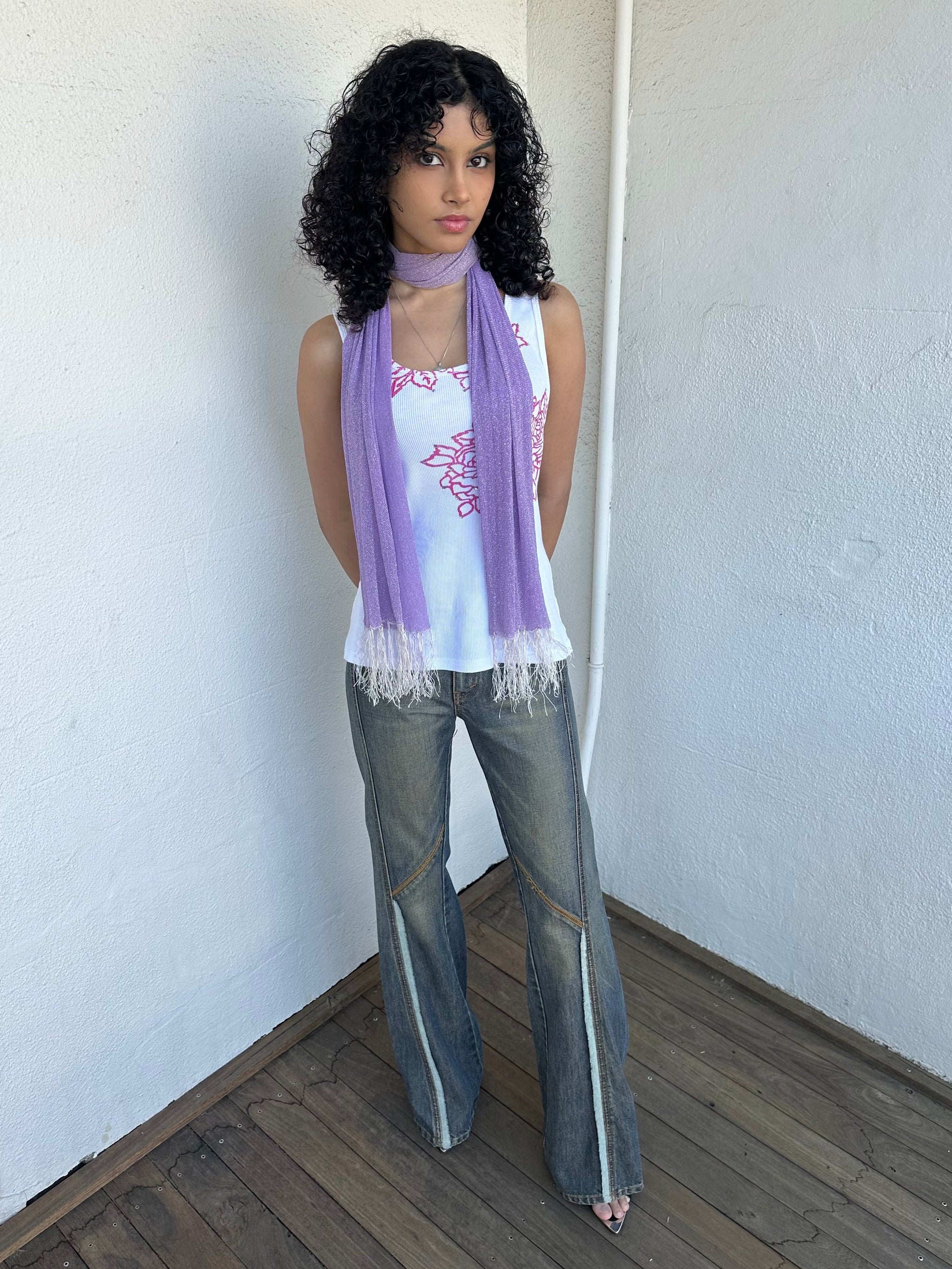 Woman wearing a Y2K 00s lilac shimmer skinny scarf from the 00s.