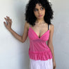 Women wearing a 00s Y2K Pink Y2K mesh ruffle hem cami with a soft, lightweight feel and subtle stretch.