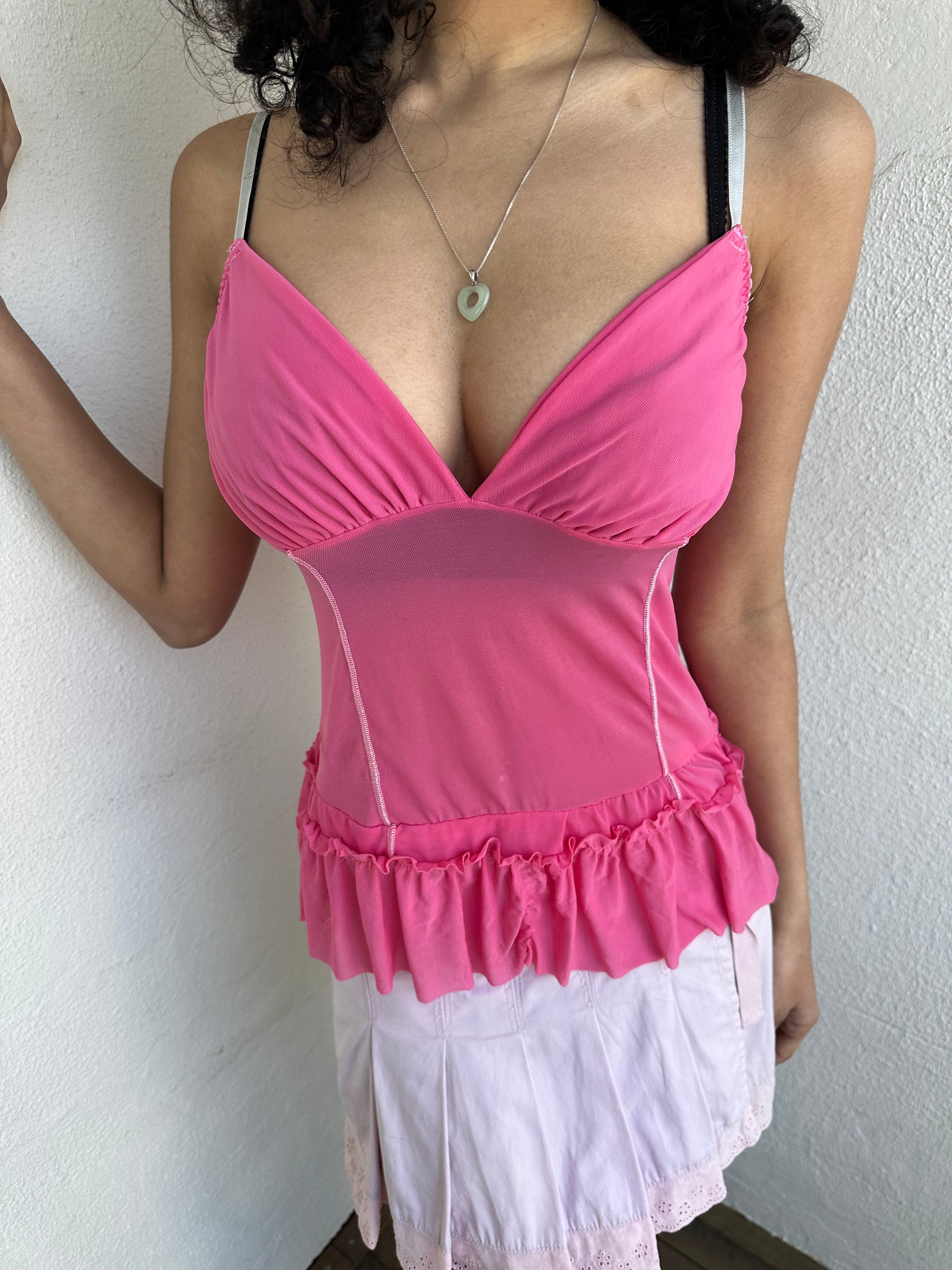 Women wearing a 00s Y2K Pink Y2K mesh ruffle hem cami with a soft, lightweight feel and subtle stretch.