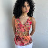 Woman wearing a Y2K 00s Pink & Orange Floral Mesh Tank with sequin detail