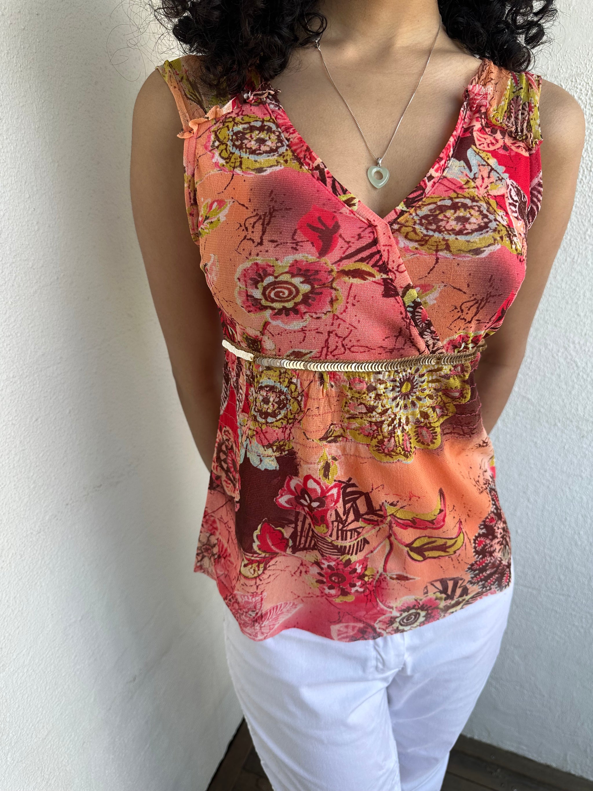 Woman wearing a Y2K 00s Pink & Orange Floral Mesh Tank with sequin detail