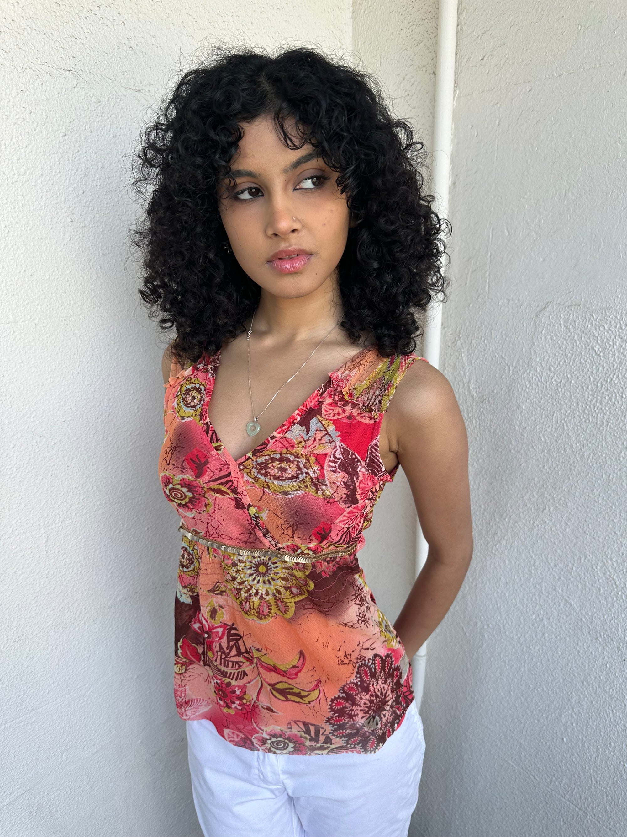 Woman wearing a Y2K 00s Pink & Orange Floral Mesh Tank with sequin detail
