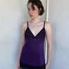 Woman Dressed in Y2K Purple Y2K leopard print cami top featuring a bold sparkly animal print bust.