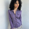 Woman wearing a Y2K 00s Purple stripe and polkadot shirt, pinstripe fabric with contrasting polkadot cuffs and trim hem