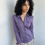 Woman wearing a Y2K 00s Purple stripe and polkadot shirt, pinstripe fabric with contrasting polkadot cuffs and trim hem