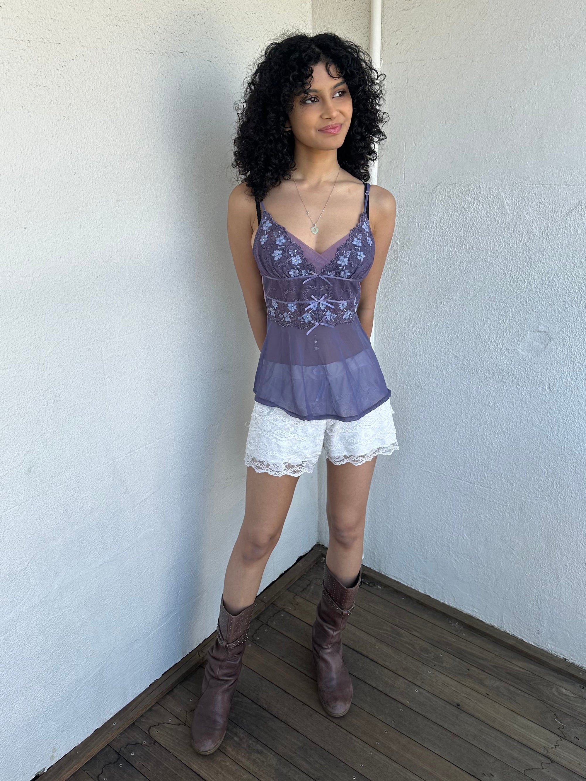 Woman wearing a Y2K 00s Purple Embroidered Fairy Cami top