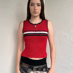 Woman wearing a Y2K 00s Black with white floral embroidery mesh cami top. Light blue floral embroidery featured 