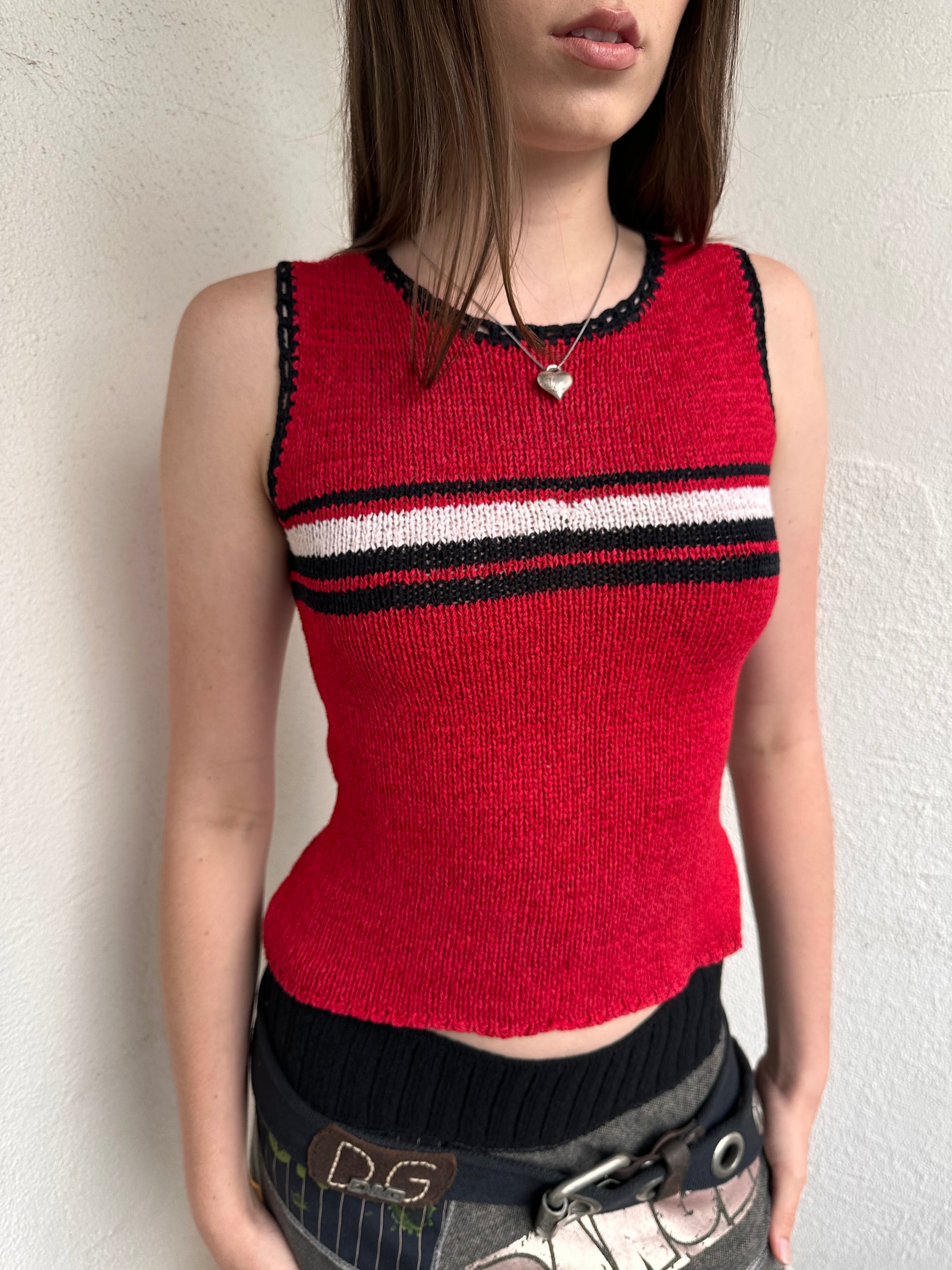 Woman wearing a Y2K 00s Black with white floral embroidery mesh cami top. Light blue floral embroidery featured 