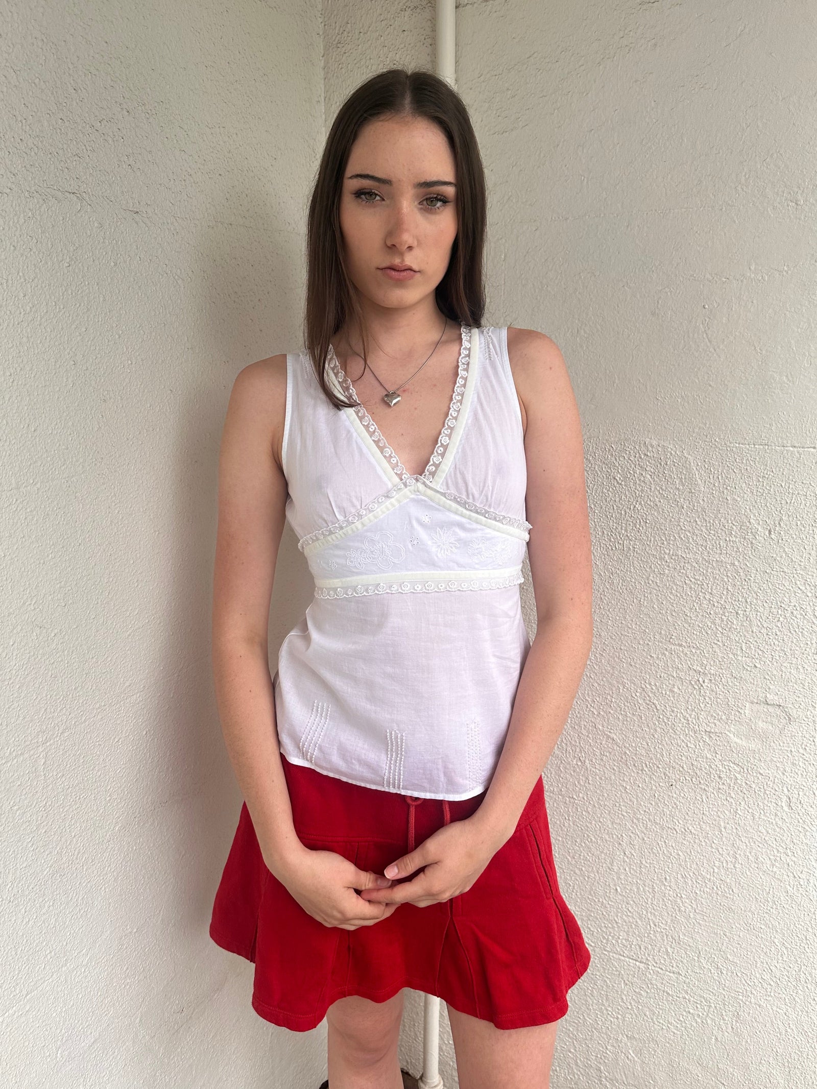 Women wearing a 00s Y2K White lace trim tank top featuring velour ribbon, lace trim and delicate floral embroidery under the bust.