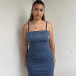 Y2K blue floral bodycon mini dress featuring a flattering fitted silhouette and floral print on the bust.