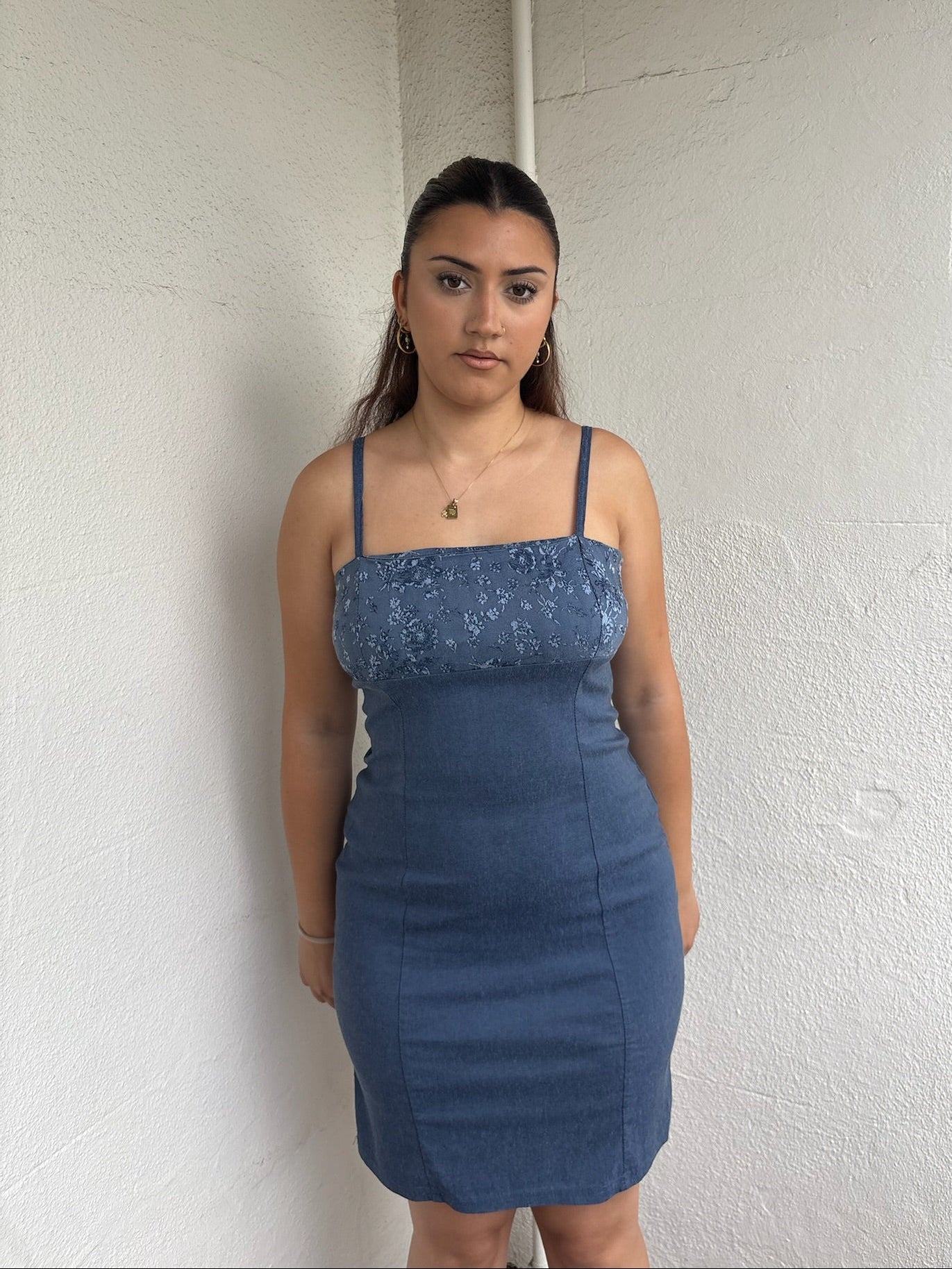 Y2K blue floral bodycon mini dress featuring a flattering fitted silhouette and floral print on the bust.